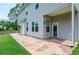 Back patio with stamped concrete transitions to a grass backyard at 2589 Cajun Dr, Marietta, GA 30066