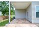 Covered back patio with stamped concrete and direct access to backyard at 2589 Cajun Dr, Marietta, GA 30066
