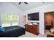 Bedroom featuring a large window and vaulted ceiling at 2589 Cajun Dr, Marietta, GA 30066