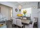 Bright dining area with a stylish chandelier, wood floors, and an elegant table setting at 2589 Cajun Dr, Marietta, GA 30066