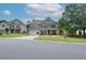 Charming home with lush front yard, showcasing a brick and siding facade and inviting curb appeal at 2589 Cajun Dr, Marietta, GA 30066