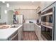 Bright kitchen features stainless steel appliances and white countertops at 2589 Cajun Dr, Marietta, GA 30066