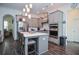 Modern kitchen boasts stainless steel appliances, gray cabinets, and a breakfast bar at 2589 Cajun Dr, Marietta, GA 30066