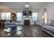 Cozy living room with hardwood floors, a fireplace, and comfortable seating arrangement at 2589 Cajun Dr, Marietta, GA 30066