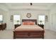 Spacious main bedroom with a tray ceiling, bedside tables and lamps, with decor accents at 2589 Cajun Dr, Marietta, GA 30066