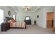 Spacious main bedroom with large windows, bedside tables and lamps, and decor accents at 2589 Cajun Dr, Marietta, GA 30066