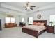Spacious main bedroom with tray ceiling, sitting area, and large windows allowing natural light at 2589 Cajun Dr, Marietta, GA 30066