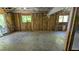 Unfinished basement with windows providing natural light and insulation at 510 Ward Rd, Ellenwood, GA 30294