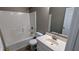 Bright bathroom features a shower-tub combination and white vanity at 510 Ward Rd, Ellenwood, GA 30294