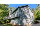 Two-story home with attached garage and deck with siding at 510 Ward Rd, Ellenwood, GA 30294