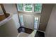 Inviting foyer showcasing hardwood floors, front door with sidelights, and modern lighting at 510 Ward Rd, Ellenwood, GA 30294