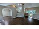 Open-concept living space with hardwood floors, arched doorways and great natural light at 510 Ward Rd, Ellenwood, GA 30294