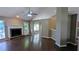 Spacious living room featuring a brick fireplace and an open concept design at 510 Ward Rd, Ellenwood, GA 30294
