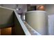 Carpeted staircase with decorative molding, offering an open view of the home's layout at 510 Ward Rd, Ellenwood, GA 30294