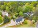 Beautiful aerial view of the home surrounded by mature trees in a peaceful neighborhood at 3152 Normandy Ne Cir, Marietta, GA 30062
