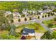Aerial view of the property with lush surroundings in a suburban neighborhood at 3152 Normandy Ne Cir, Marietta, GA 30062