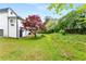 Beautiful backyard boasting mature trees and a well-manicured lawn at 3152 Normandy Ne Cir, Marietta, GA 30062