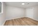 Bedroom with hardwood floors, closet, and a window providing natural light at 3152 Normandy Ne Cir, Marietta, GA 30062