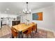 Inviting dining area features a modern chandelier and stylish decor enhancing the eating space at 3152 Normandy Ne Cir, Marietta, GA 30062