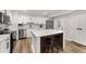 Kitchen with a large island, stainless appliances, and white cabinets with black hardware at 3152 Normandy Ne Cir, Marietta, GA 30062