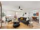 Open concept living room with modern decor and seamless flow to dining area at 3152 Normandy Ne Cir, Marietta, GA 30062