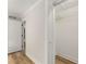 Walk-in closet featuring a view to an adjacent bedroom and open shelving at 3152 Normandy Ne Cir, Marietta, GA 30062