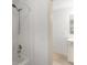 Bathroom showcasing shower and partial vanity at 550 Eldridge Dr, Suwanee, GA 30024