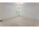 Bright carpeted bedroom with great natural light at 550 Eldridge Dr, Suwanee, GA 30024