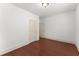 Empty bedroom with hardwood floors and white walls at 550 Eldridge Dr, Suwanee, GA 30024