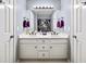 Well-lit bathroom featuring a double sink vanity with modern fixtures, framed mirror, and an LSU-themed shower curtain at 3465 Summit Trl, Cumming, GA 30041