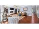 Spacious living room featuring a fireplace, hardwood floors, and neutral tones create a comfortable atmosphere at 3465 Summit Trl, Cumming, GA 30041