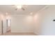 A bright, carpeted bedroom with crown molding and natural light showcases versatile living space at 3981 Adler Cir, Buford, GA 30519