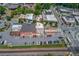 Aerial view of a downtown street, with parking, railway, and various commercial buildings at 4048 Suzanne Ln, Duluth, GA 30096