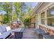 Cozy back deck with outdoor seating, perfect for relaxing and enjoying the view at 4048 Suzanne Ln, Duluth, GA 30096