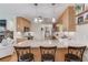 Bright kitchen with granite counters, stylish backsplash, stainless appliances, and pendant lighting at 4048 Suzanne Ln, Duluth, GA 30096