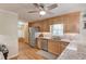 Eat-in kitchen boasts stainless appliances, beautiful countertops and wood cabinets at 4048 Suzanne Ln, Duluth, GA 30096