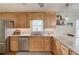 Eat-in kitchen features stainless appliances and granite countertops at 4048 Suzanne Ln, Duluth, GA 30096