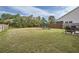 This large backyard features a play area, and an irrigation system at 4929 Dufour Dr, Lilburn, GA 30047
