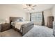 This primary bedroom is bright and spacious with an ample closet and plush carpet at 4929 Dufour Dr, Lilburn, GA 30047