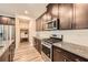 Beautiful kitchen with stainless steel appliances, granite countertops, and an open layout at 4929 Dufour Dr, Lilburn, GA 30047