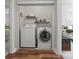 Convenient closet laundry room features a modern washer and dryer set at 7 Nesbit Pl, Alpharetta, GA 30022