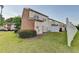 View of the backyard showing a well manicured lawn and privacy fence at 801 Old Peachtree Nw Rd # 56, Lawrenceville, GA 30043