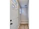 Bright foyer with hardwood floors, a window, and a stairway leading to the next level at 801 Old Peachtree Nw Rd # 56, Lawrenceville, GA 30043