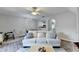 Open concept living space connects the living room, dining area, and kitchen at 801 Old Peachtree Nw Rd # 56, Lawrenceville, GA 30043