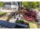 Aerial view of backyard with patio, seating, and professionally landscaped yard at 1076 Manigault Se St, Atlanta, GA 30316