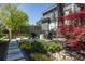 Backyard seating area with manicured landscaping featuring an ornamental tree at 1076 Manigault Se St, Atlanta, GA 30316