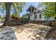 Backyard concrete pad with designer fence offering an outdoor space for entertaining or relaxing at 1076 Manigault Se St, Atlanta, GA 30316