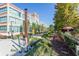 A view along the Atlanta BeltLine lined with trees, plants, and colorful art installations at 1076 Manigault Se St, Atlanta, GA 30316