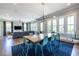 Open-concept living and dining area, perfect for entertaining and everyday living with hardwood floors and neutral tones at 1076 Manigault Se St, Atlanta, GA 30316