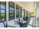 Inviting front porch with comfortable seating, perfect for enjoying the neighborhood views at 1076 Manigault Se St, Atlanta, GA 30316